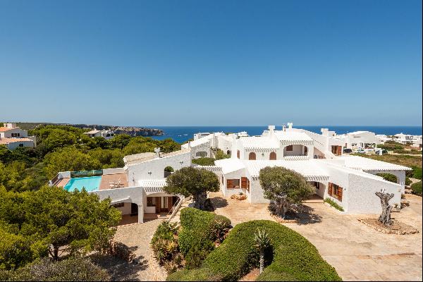 Villa boasting a pool and expansive garden set amidst natural coast