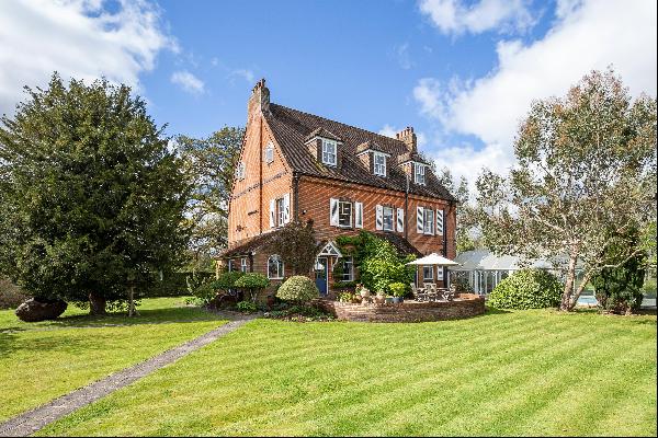 A substantial residential estate in outstanding grounds on the Surrey/Hampshire border.