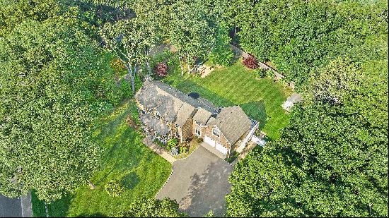 This beautiful 5 bedroom, 4 bath gem is located on an immaculate .69 acre lot in Southampt