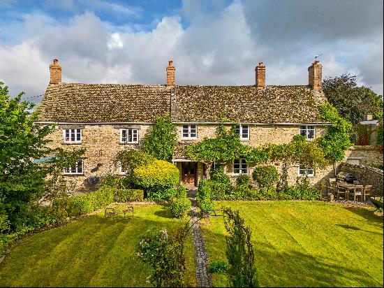 A delightful farmhouse set back on a desirable lane within the popular village of Weston o