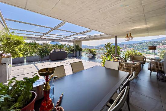 Lugano-Pregassona: spacious penthouse apartment for sale with magnificent view of the cit