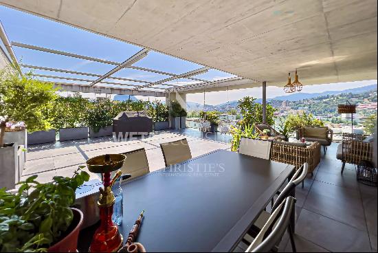 Lugano-Pregassona: spacious penthouse apartment for sale with magnificent view of the cit