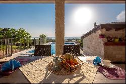 HOUSE WITH SEA VIEW AND POOL