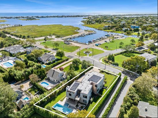 Welcome to a home entertaining experience like no other in the heart of Westhampton Beach 