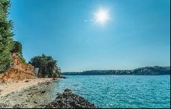 WATERFRONT PENTHOUSE WITH PRIVATE BEACH FOR SALE IN CROATIA