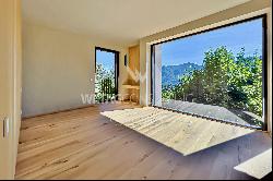 Lovely newly built villa with a large terrace & lake view in Muzzano for sale