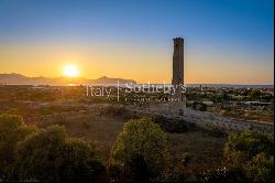 Ancient water tower near the sea in Bagheria