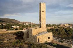 Ancient water tower near the sea in Bagheria