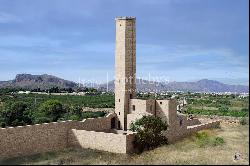 Ancient water tower near the sea in Bagheria