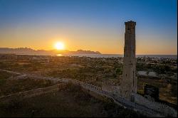 Ancient water tower near the sea in Bagheria