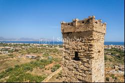 Ancient water tower near the sea in Bagheria