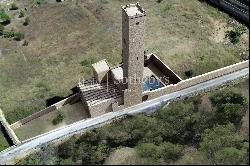 Ancient water tower near the sea in Bagheria