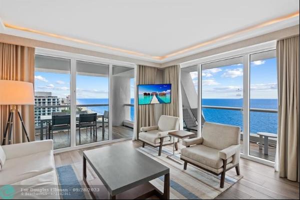 Experience luxury oceanfront living in this fully furnished, turn-key 2-bed residence at T