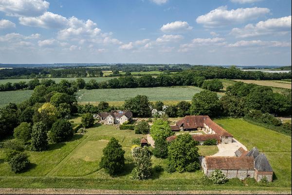 A stunning collection of Grade II listed buildings, including a farmhouse, converted barn 