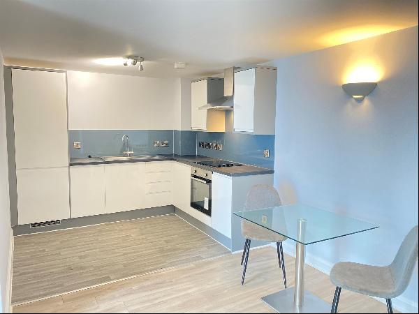 This spacious, fourth floor, two-bedroom apartment comes with a  balcony, parking space an