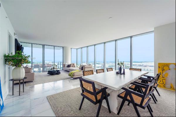 Priced to sell! Four floors below the penthouse with 270-degree ocean, bay and city views,