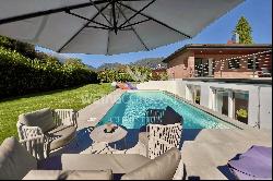 Lugano-Origlio: elegant villa for sale with pool, sauna, fitness area, & low-maintenance 