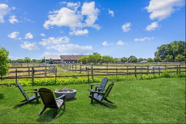 Located in Water Mill on a quiet cul-de-sac, this just-renovated light-filled home feature