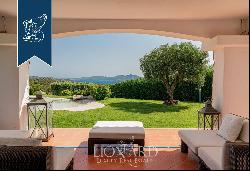 Villa with a garden and a panoramic pool for sale on the hill of Capo d'Orso in Palau