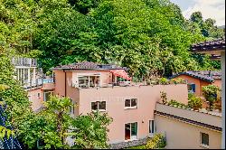 Lugano-Castagnola: elegant triplex penthouse for sale with pool, lake view & close to Lug