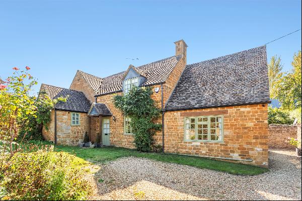 A detached three bedroom cottage with gardens and parking