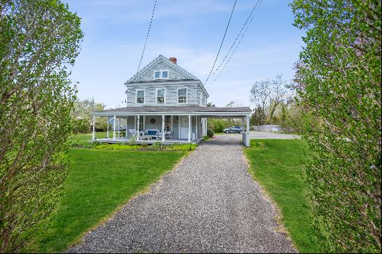 Sit back and relax on the inviting wrap around porch. There is plenty of room for family a