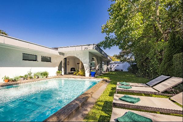 Extensively renovated midcentury bungalow with special aesthetics and pool