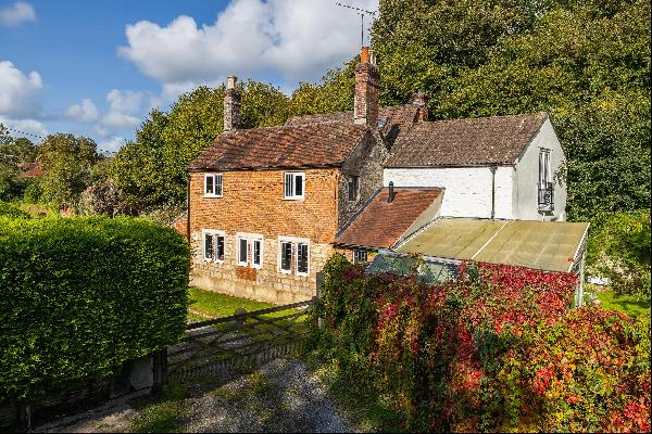 An attractive 4 bedroom red brick period detached family home, with land and development p
