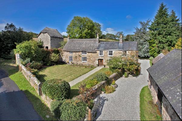 Fabulous country home near Chagford with a number of outbuildings, all set within beautifu