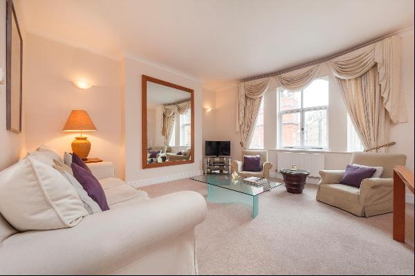 A well proportioned apartment situated on the second floor of a sought-after building in M