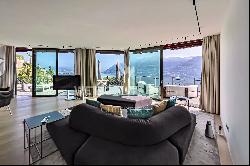 Exclusive apartment with 180° panoramic view on Lake Maggiore in Brissago for sale