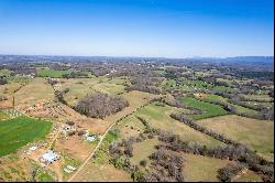 Breathtaking 56-Acre Mountain View Farmstead with Creek Frontage