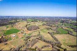 Breathtaking 56-Acre Mountain View Farmstead with Creek Frontage