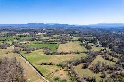 Breathtaking 56-Acre Mountain View Farmstead with Creek Frontage