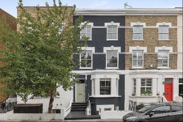 A five/six bedroom townhouse currently arranged as a house with a lower ground floor flat 