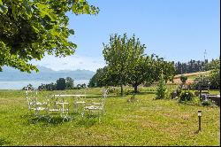 370 m² farmhouse with lake view in a green setting