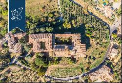 Benedectine abbey founded in the year 730 for sale on Siena's hills