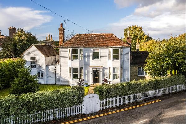 A most attractive Grade II listed family house, in a prominent position on the popular Moo