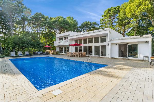 This stunning 5 bedroom/ 3 bathroom summer house is located in the East Quogue Hamptons ar
