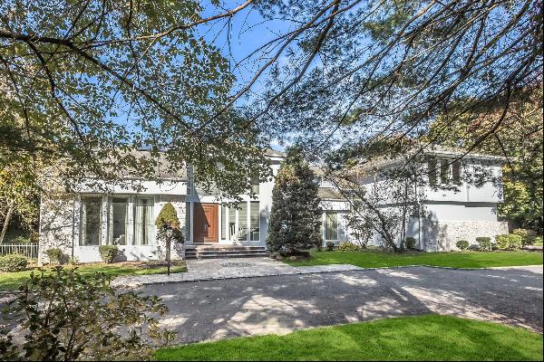 Welcome to this Magnificent Contemporary Center Hall Colonial in a Gated Community on 2 Ac