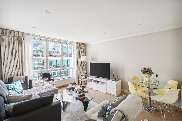 A well-appointed two bedroom flat on the fifth floor with underground parking, lift and re