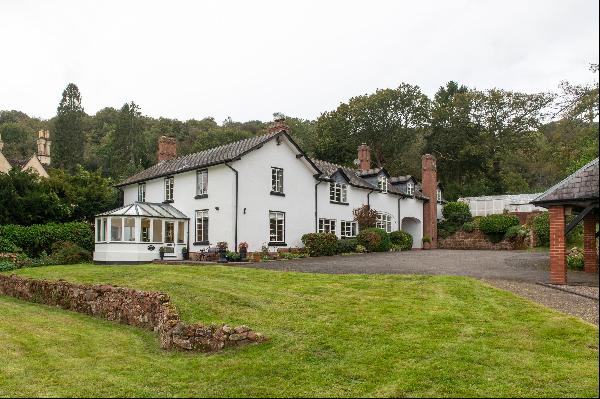 A period house offering flexible living in 51 acres with excellent equestrian facilities a