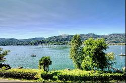 In Montagnola modern design villa with a 180° view of Lake Lugano for sale