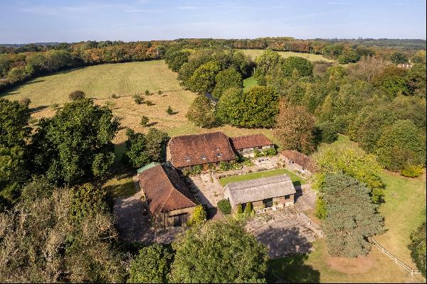 A unique converted barn, in a delightful and peaceful rural setting, with land and numerou