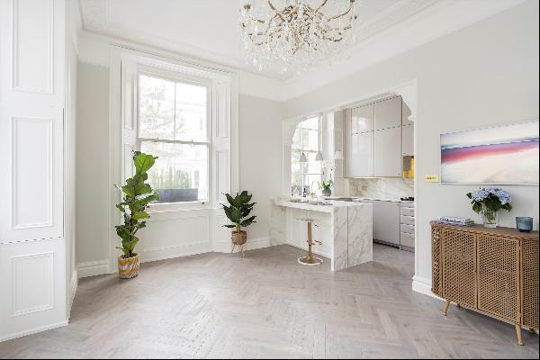 A stunning duplex apartment for sale located on Palace Gardens Terrace, W8.