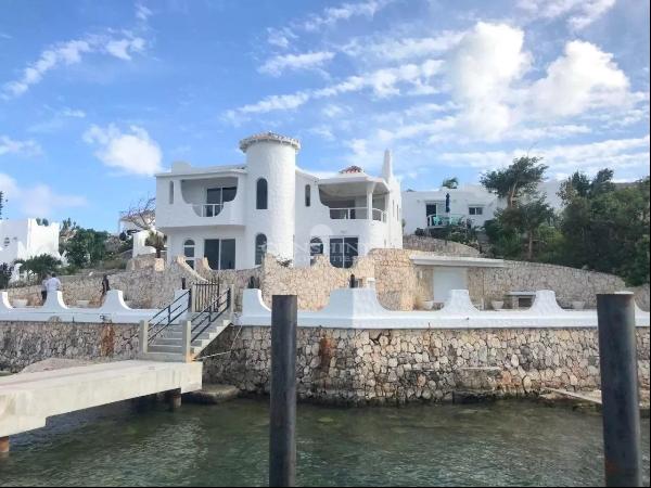 Rare lagoon-front villa with boat dock
