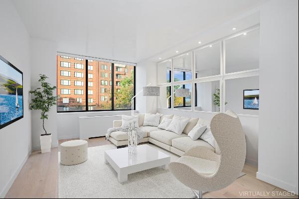 The epitome of luxury living in Battery Park City! This elegant 2-bedroom 2-bathroom resid