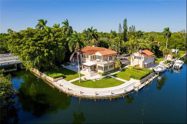Introducing the pinnacle of waterfront living in this stunning Cocoplum, Phase 1 property,