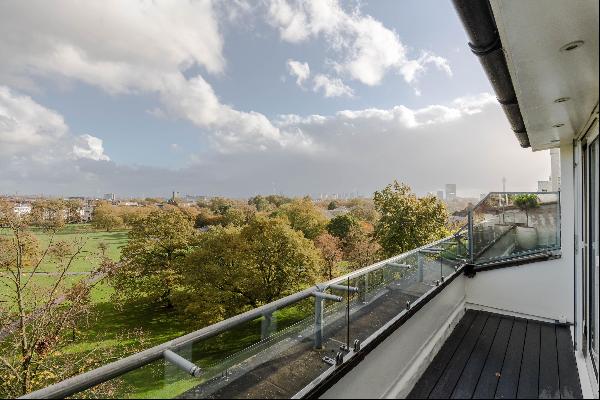Impressive two bedroomed apartment with tree top views overlooking Primrose Hill, NW8.