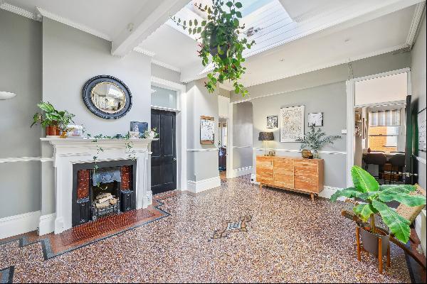 Nestled within an Edwardian mansion block with a picturesque view of Richmond Bridge and t